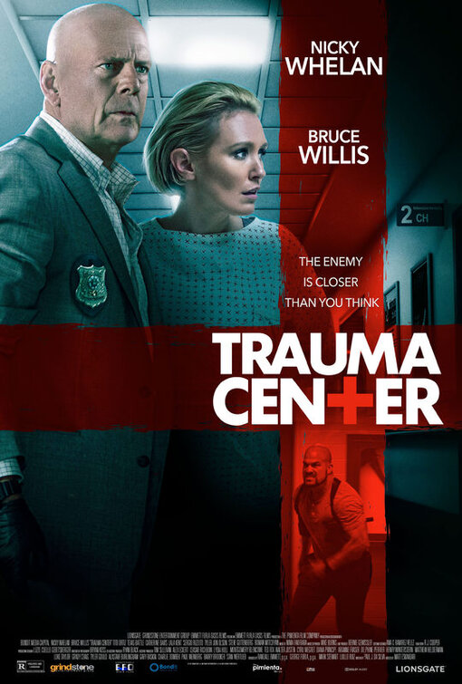 Bruce Willis, Tito Ortiz, and Nicky Whelan in Trauma Center (2019)