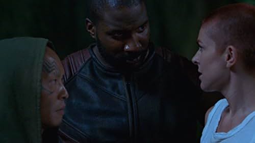 Serinda Swan and Eme Ikwuakor in Inhumans (2017)