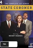 Bob Baines, Andrew Clarke, and Wendy Hughes in State Coroner (1997)