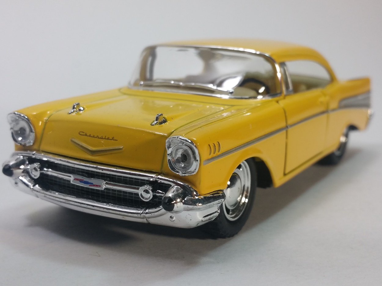 KinsmartCanary Yellow 1957 Chevy Bel Air 2 Door Coupe 1/40 Scale Diecast Car by Kinsmart