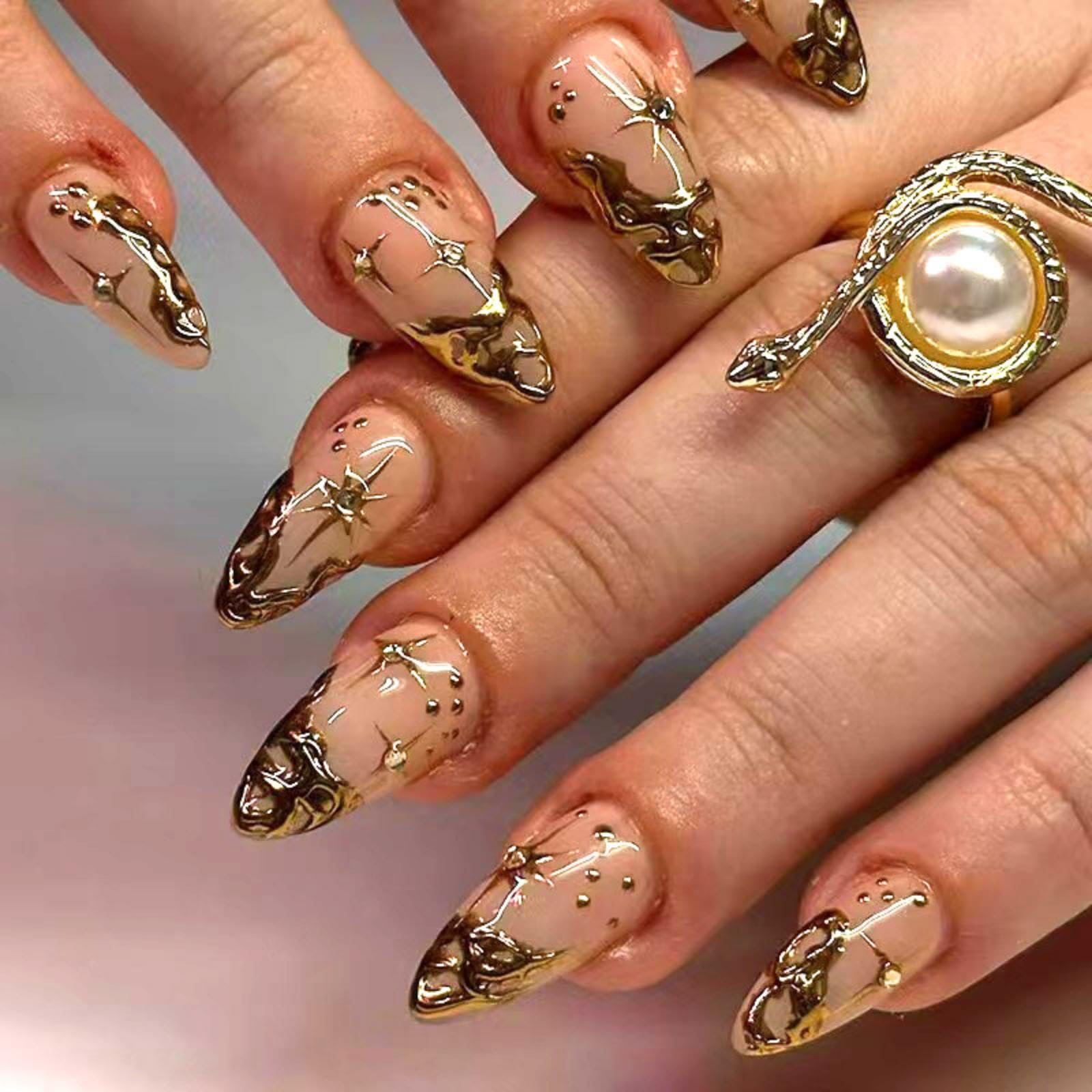 Gold French Tip Press on Nails Short Almond Fake Nails Nude False Nails With 3D Gold Irregularity Chrome Design Glue on Nails Glossy Acrylic Full Cover Star Moon Stick on Nails for Women 24Pcs