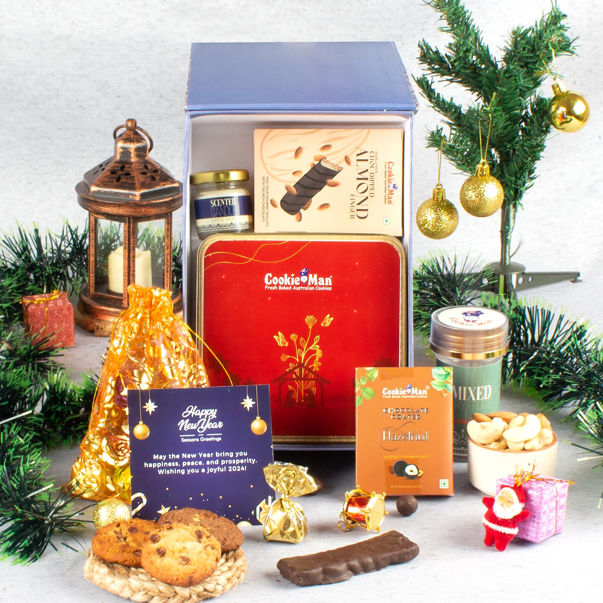 CookieMan Premium Jolly Christmas Treat, 570g | Assorted Cookies Tin, Chocolate Almond Fingers, Twisty Chocolates, Coated Hazelnuts, Mixed Dry Fruits, Scented Candle & Greeting Card | Christmas Gift Hamper