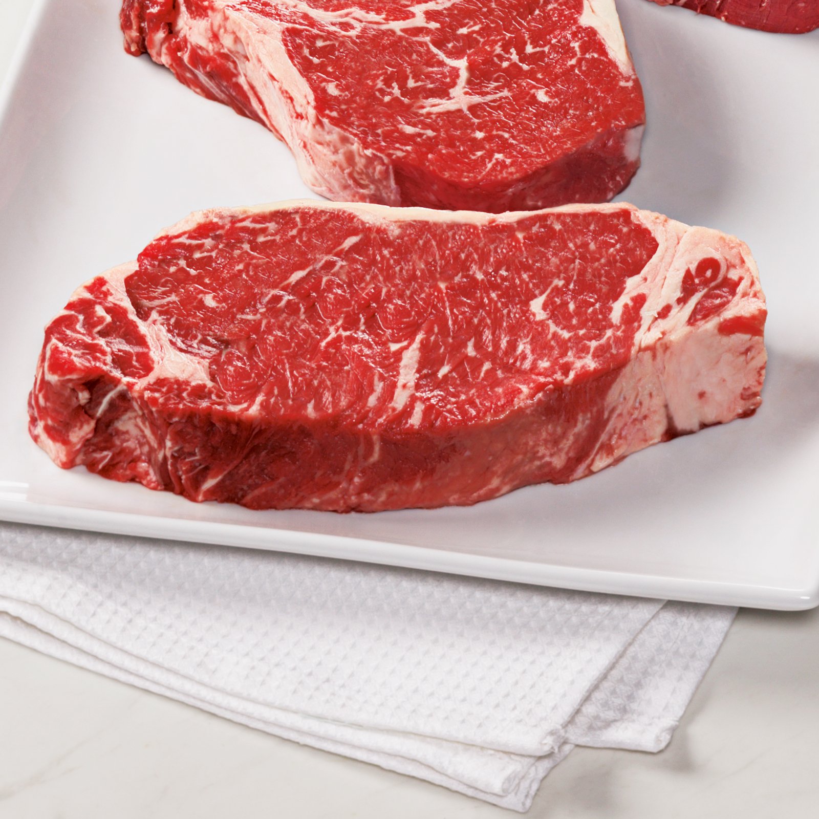 4 Gift Boxed Private Stock USDA Prime Kansas City Strips, 12 oz each from Kansas City Steaks. A premium gift for true steak lovers