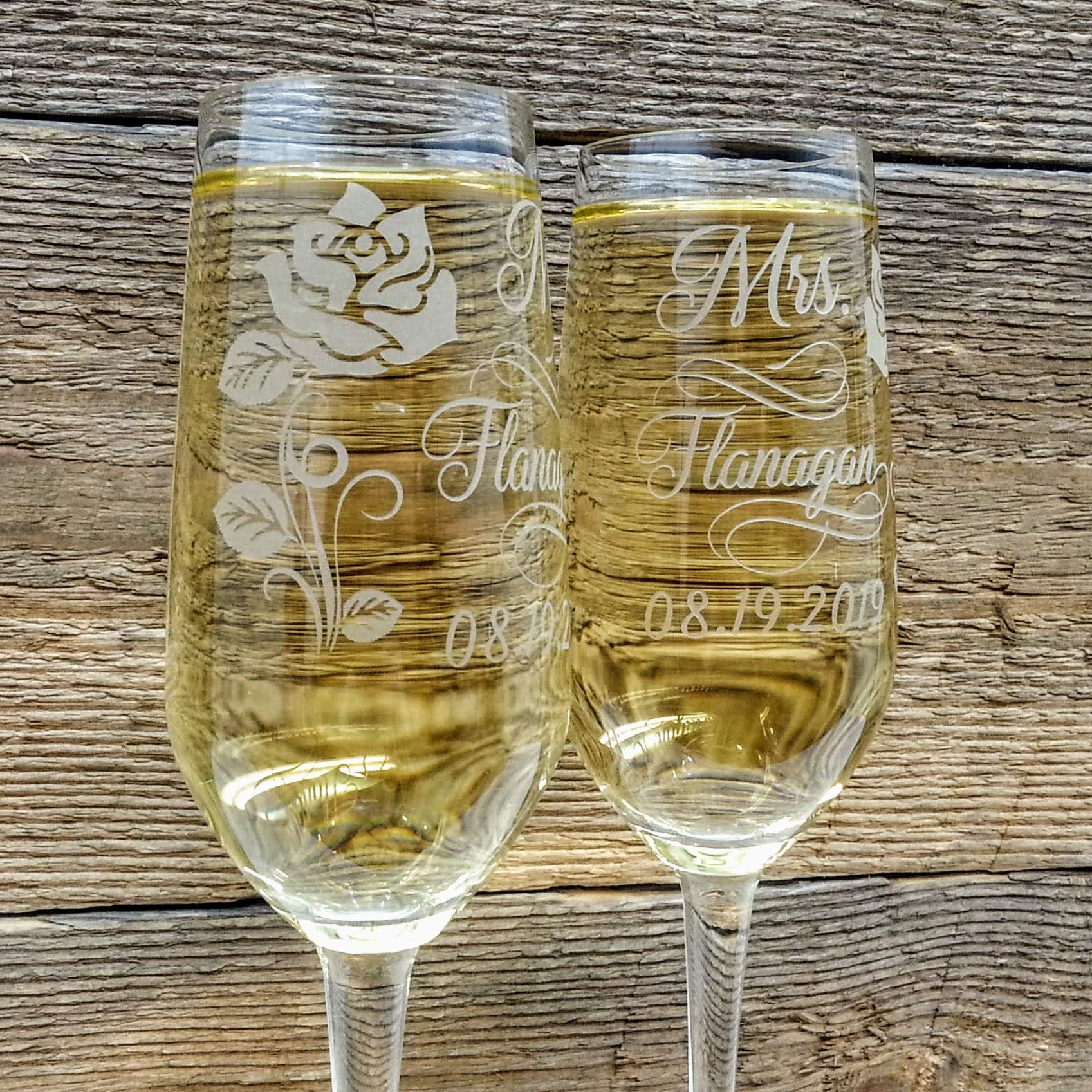 Personalized Wedding Toast Champagne Glasses for Groom and Bride Custom Engraved with Mr and Mrs Last Name Date and Rose Design Wedding Gift set of 2