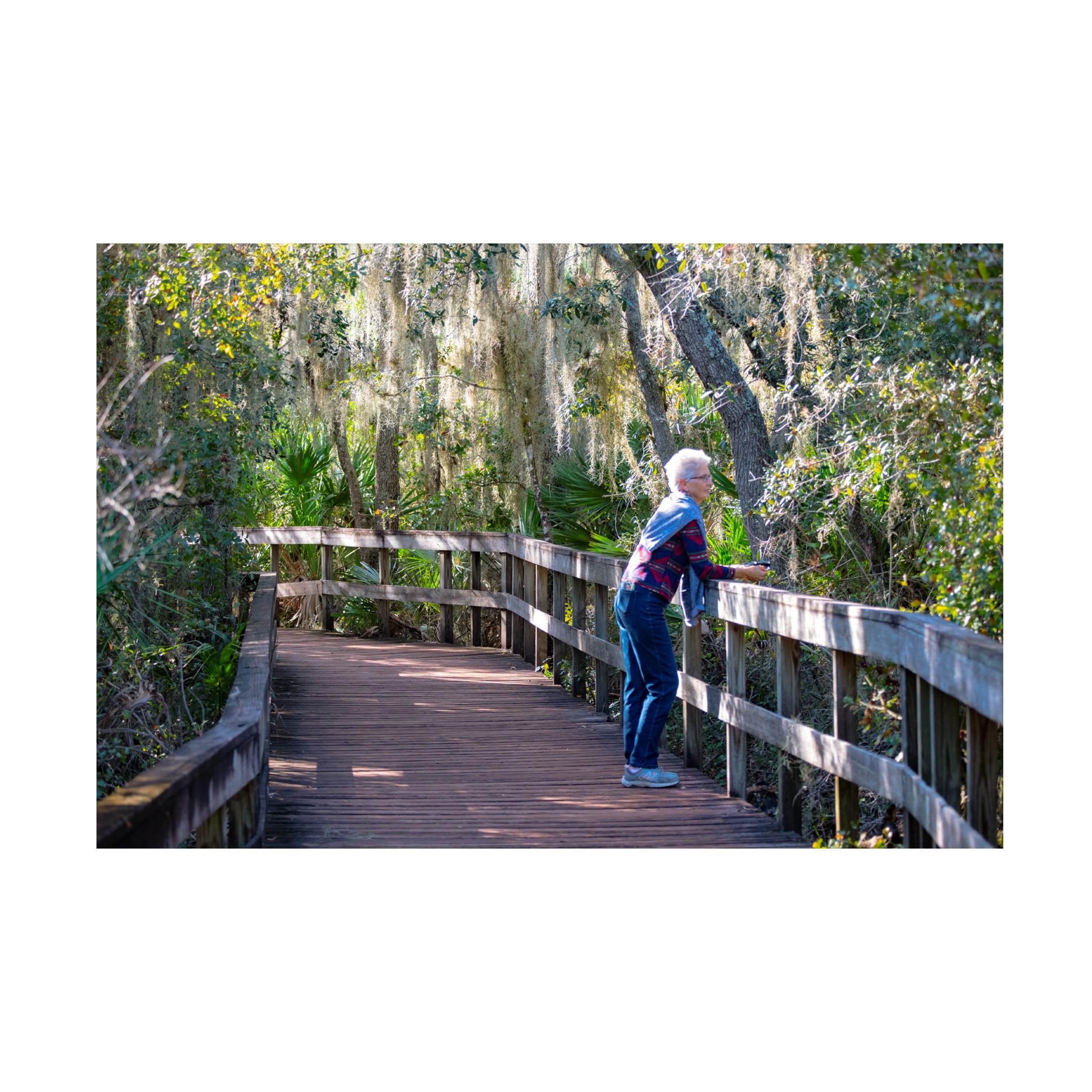 Robert Michaud 'Senior On Boardwalk' Canvas Art