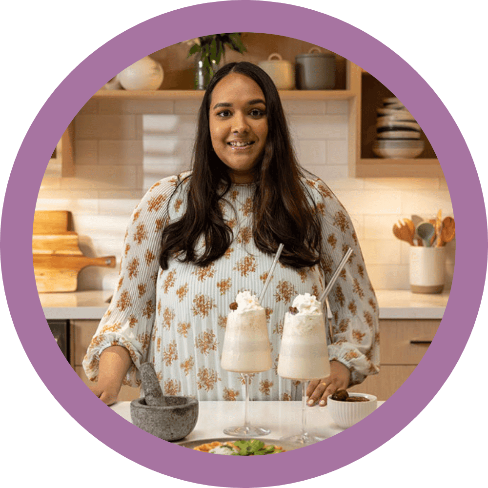 Shweta in a Professional Kitchen with milkshakes.