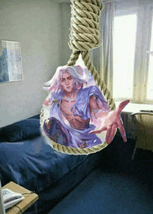 a picture of a man is hanging from a rope