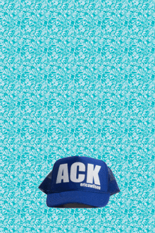 a blue hat with the word ack written on it