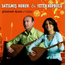 a man and a woman are playing guitars on the cover of a music album