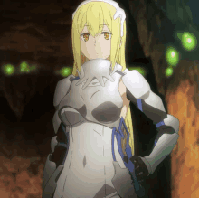 a girl with blonde hair and white armor is standing in a dark cave