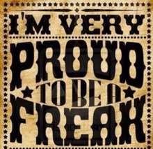 a sign that says " i 'm very proud to be a freak "