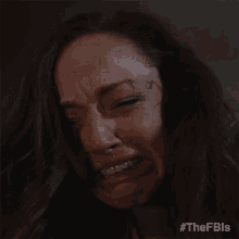 a close up of a woman crying with the hashtag #thefbls on the bottom