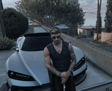 a man in a plaid vest stands next to a white car