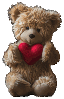 a teddy bear holding a red heart in its paws