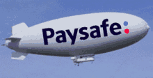 a white blimp with paysafe written on the side