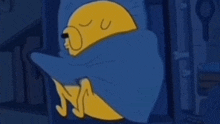 a cartoon character is sleeping with a blue blanket