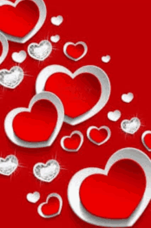 a red background with white hearts and diamonds on it