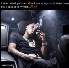 a man sitting in a car smoking a cigarette with the caption i heard what you said