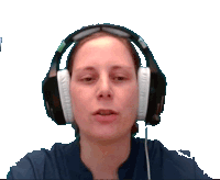 a woman wearing headphones with a blue shirt on