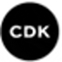 a black circle with the word cdk on it