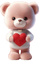 a teddy bear wearing a white sweater is holding a red heart in its hands .