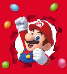 a cartoon of mario is surrounded by colorful candies on a red background