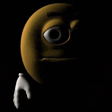 a cartoon smiley face is standing in the dark with a white hand .