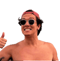 a shirtless man wearing sunglasses giving a thumbs up