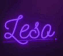 a neon sign that says lesa on a purple background