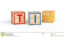 three wooden blocks with the letters t and m written on them