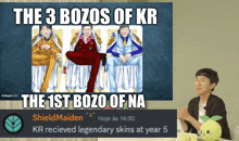 a man sits in front of a poster that says the 3 bozos of kr