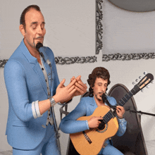 a man in a blue suit is singing into a microphone while another man plays a guitar