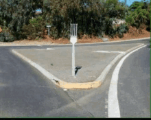 a fork is painted in the middle of the road