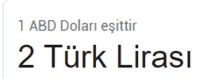 a sign that says 1 abd dolari eşittir 2 türk lirasi on it