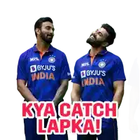 two men wearing blue jerseys that say byju 's india