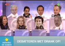 a group of people sitting in front of a sign that says debateren met drank op!