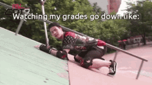 a man is crawling down a ramp with the words " watching my grades go down like " below him