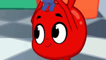 a red cartoon character with big eyes and a blue hat