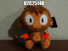 a stuffed monkey with a tag that says d2c2514d on it