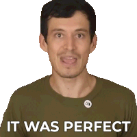 a man wearing a green shirt with a button that says it was perfect