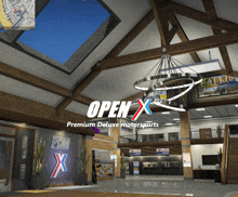 an open x premium deluxe motorsports sign hangs from the ceiling of a large building