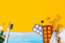 a thermometer is surrounded by pills and a mask on a yellow background