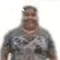 a blurry picture of a man in a military uniform with a speech bubble coming out of his mouth .