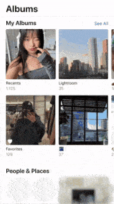 a screenshot of an app called albums showing a girl taking a selfie