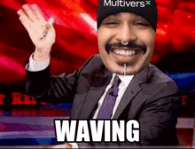 a man in a suit and tie is wearing a hat that says multivers on it