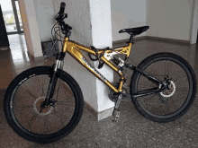 a mongoose bike is parked on a tiled floor