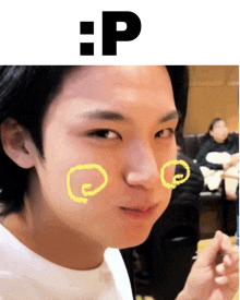 a man with a yellow circle drawn on his cheek and the letter p above him