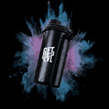 a black shaker that says get off evil is surrounded by blue and pink powder