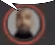 a blurry picture of a person in a circle with a speech bubble above it