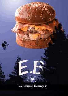 a poster for the extra boutique shows a hamburger on a bun